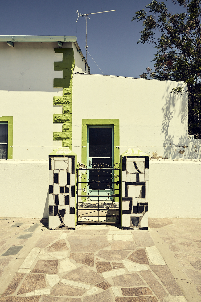 Green and white house