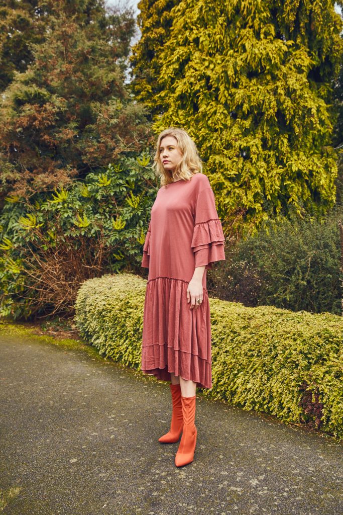 Girl in orange boots